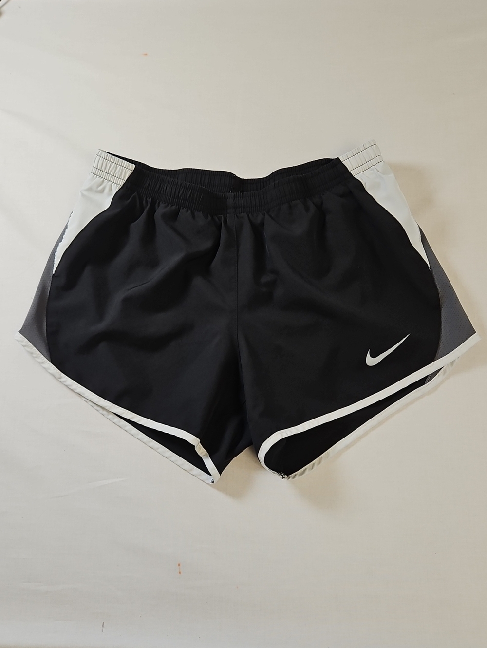 Nike Women's Black Lined Athletic Shorts with White/Gray Accents, Size Small